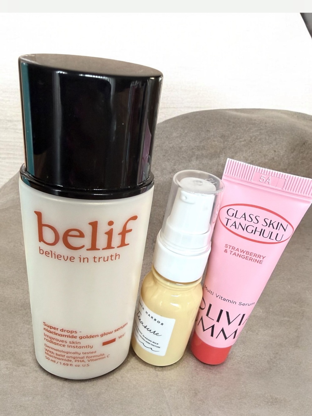 5/$25 BELIEF Super Drops Golden Glow Serum - with two small skincare items
